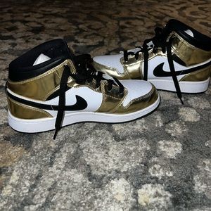 Metallic Gold Size 6.5 Jordan’s